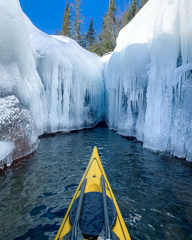 winter kayaking on lake crossing the Icefall